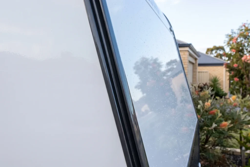 Ceramic coating edge and seam detail on a freshly detailed caravan in O'Connor WA