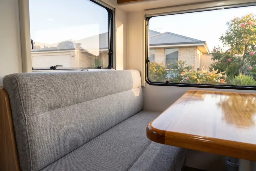 Spotless caravan interior with clean upholstery and polished timber after detailing in O'Connor