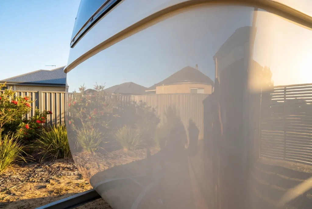 Restored glossy caravan panel after oxidation removal detailing in O'Connor WA
