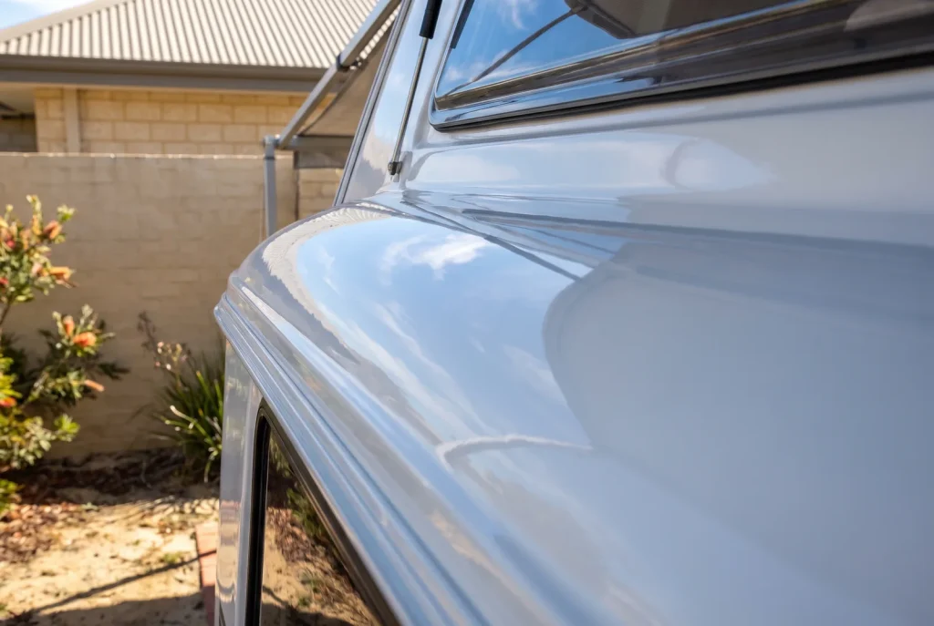 Oxidation removal result on a gleaming restored caravan exterior in O'Connor WA