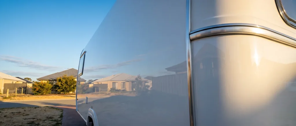 Oxidation removal restoring glossy caravan side panel finish in O'Connor WA caravan detailing